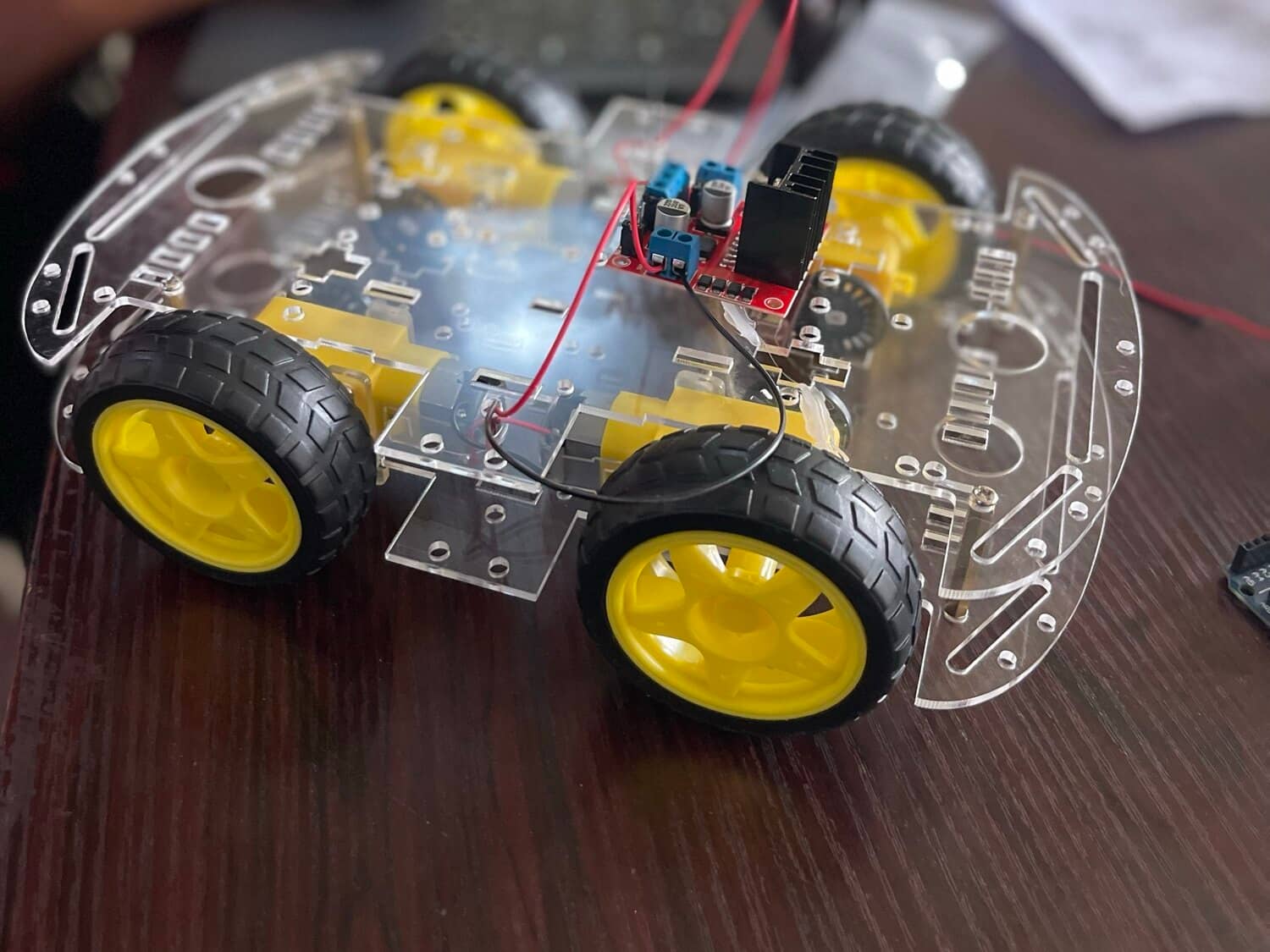The bare chassis on its wheels, motors wired, nothing else on it yet